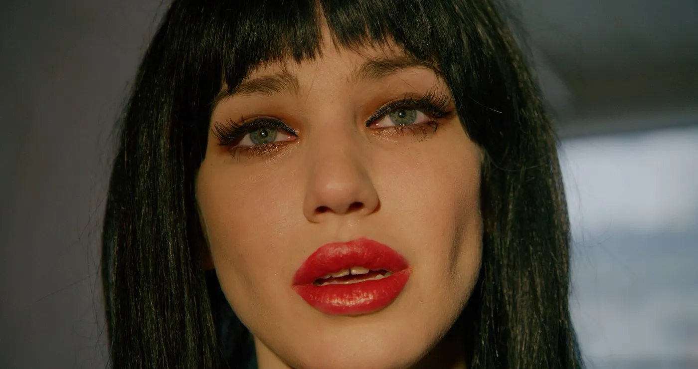 Music video still — portrait